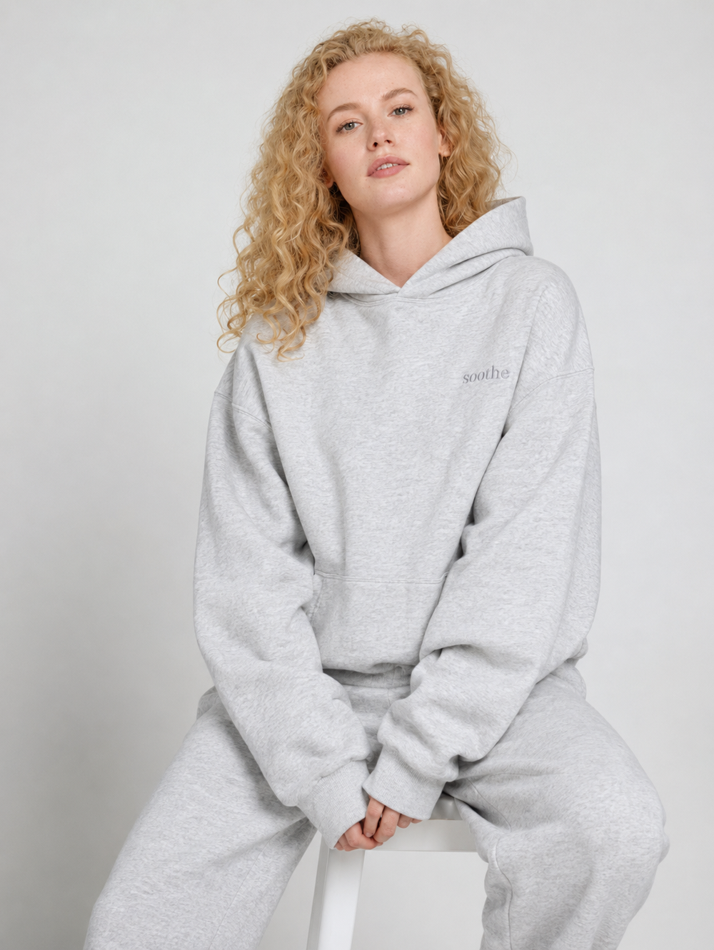 Grey sitting